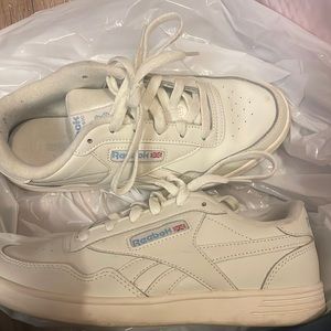 White Reebok sneakers